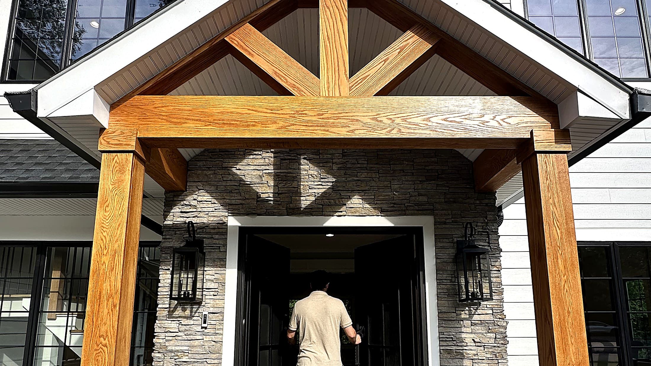 Custom timber-frame entry of a Bergen County home